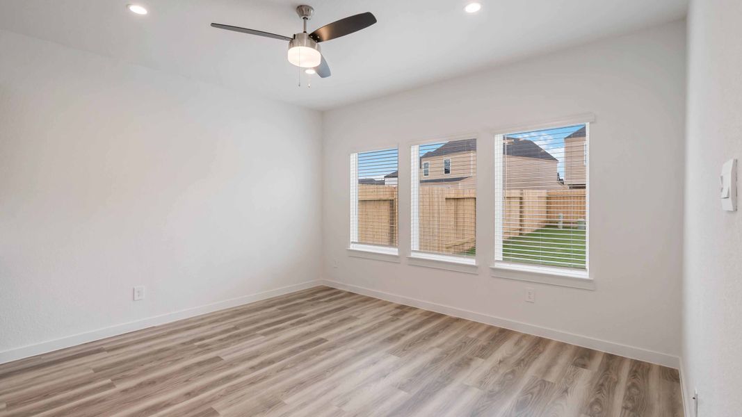 Representative unfurnished interior of a home built from the Iris by D.R. Horton in City Gate North, Houston (Image 9).