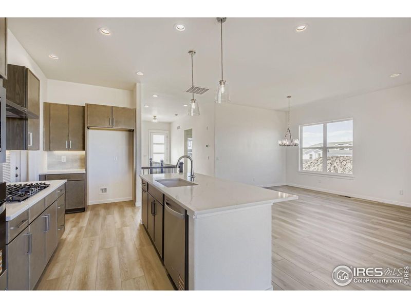 Furnished interior view inside a new home in RainDance - 60s, Windsor (Image 6).