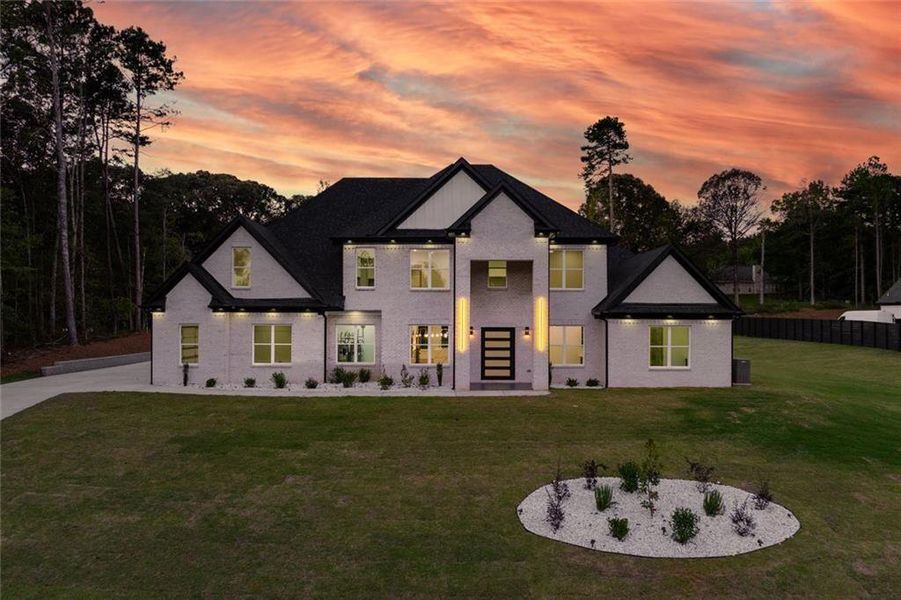 Front exterior of a new home in , Loganville, GA, highlighting curb appeal (Image 2).