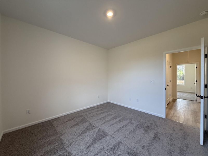 Spacious, unfurnished interior of a new home in Westwood Reserve, Conway (Image 30).