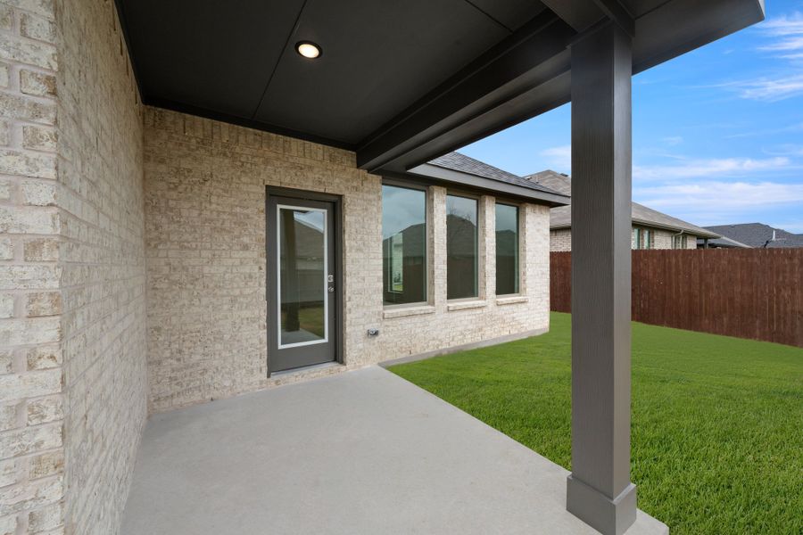 Exterior details and patio area of a home in Vista Point, Grandview (Image 17).