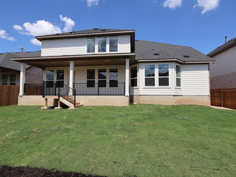 Front exterior of a new home in Edgewood, Leander, TX, highlighting curb appeal (Image 2).