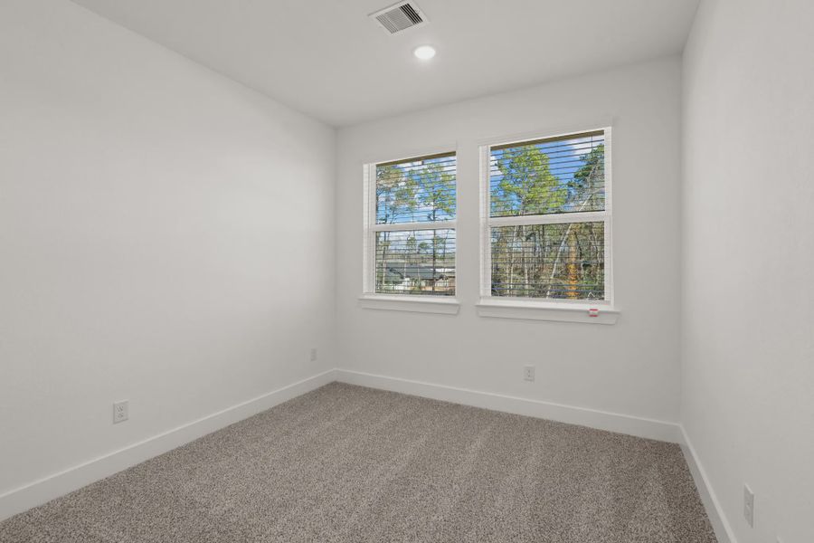 Representative unfurnished interior of a home built from the Cheverny by Chesmar Homes in Santa Rita Ranch, Liberty Hill (Image 11).