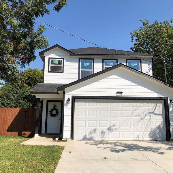 Front facade featuring a garage