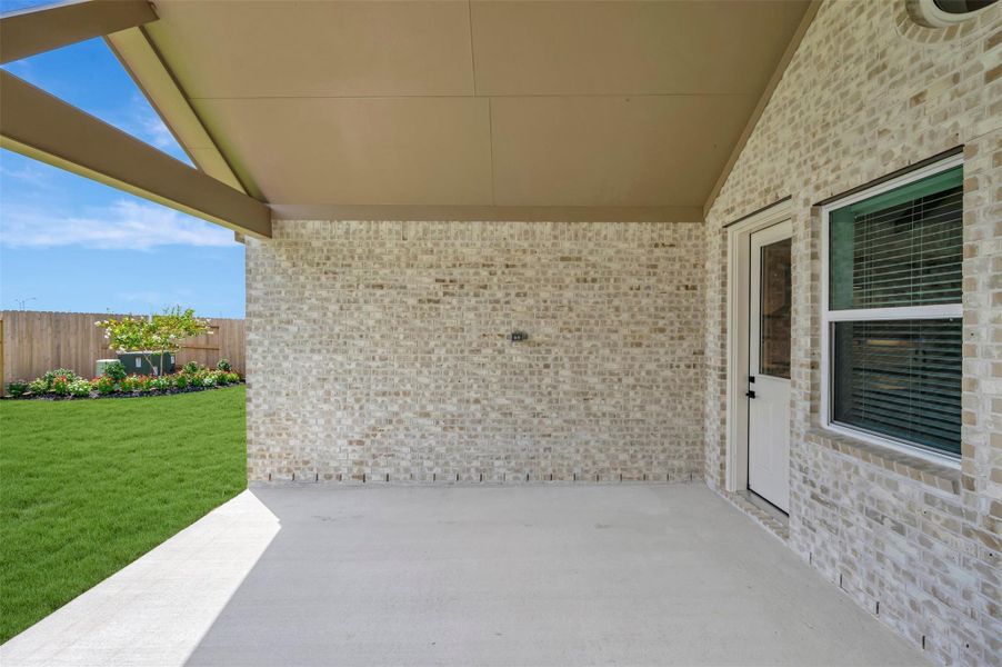 Relax outdoors in the covered patio