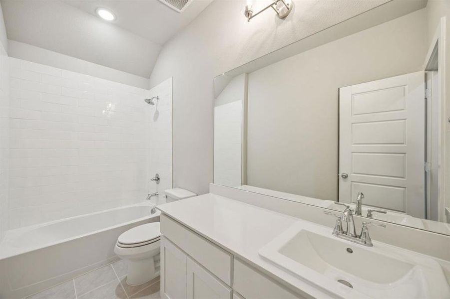 Bathroom in the Oscar home plan by Trophy Signature Homes – REPRESENTATIVE PHOTO Bathroom in the Oscar home plan by Trophy Signature Homes – REPRESENTATIVE PHOTO
