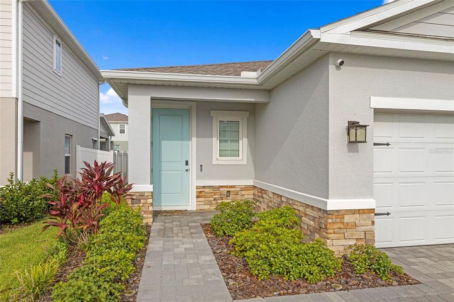 Front exterior of a new home in , Lakewood Ranch, FL, highlighting curb appeal (Image 22).