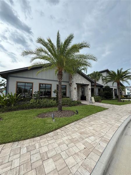 Front exterior of a new home in , Orlando, FL, highlighting curb appeal (Image 25). Front exterior of a new home in , Orlando, FL, highlighting curb appeal (Image 25).