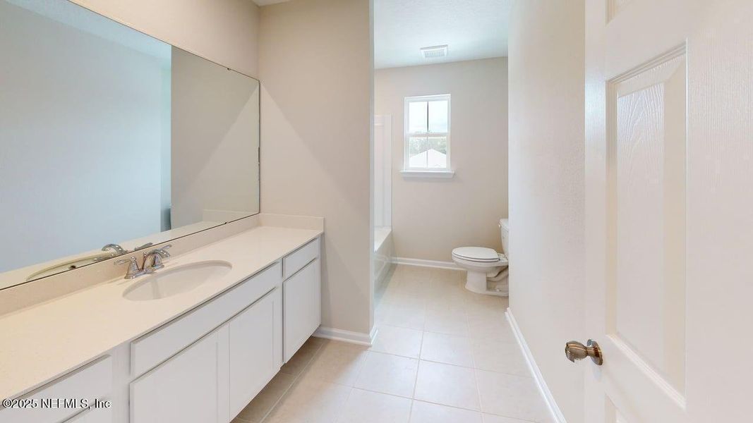 Furnished interior view inside a new home in Sandridge Hills, Green Cove Springs (Image 5).