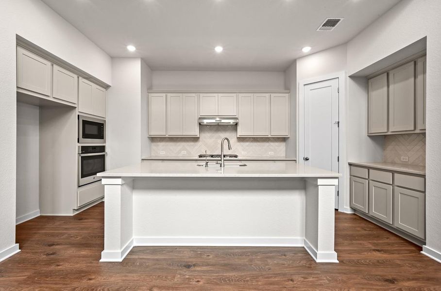 Furnished interior view inside a new home in 6 Creeks at Waterridge, Kyle (Image 8).