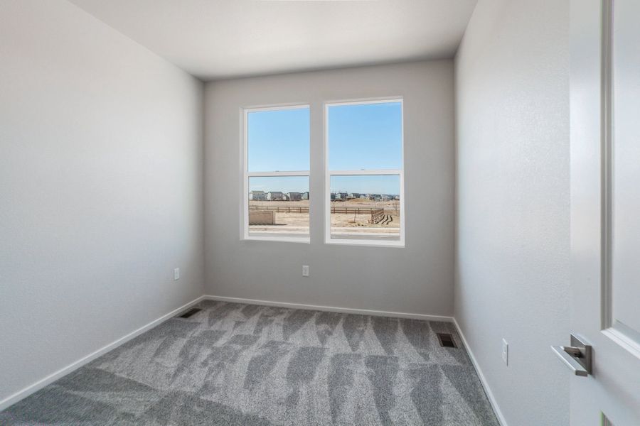 Spacious, unfurnished interior of a new home in Prairie Song, Windsor (Image 37).