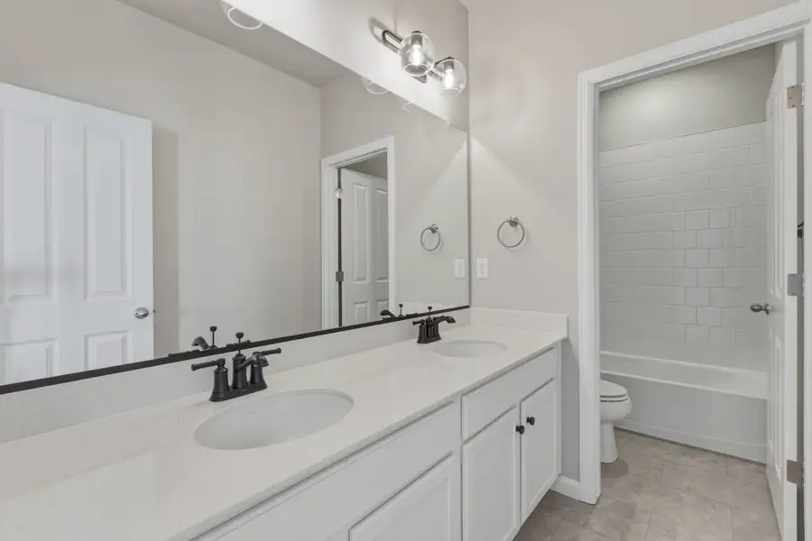 Furnished interior view inside a new home in The Aurora Highlands, Aurora (Image 10).