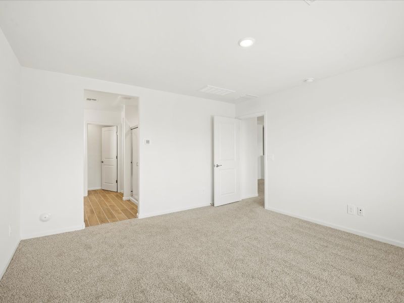 Spacious, unfurnished interior of a new home in Mandarina - Signature Series, Marana (Image 15).