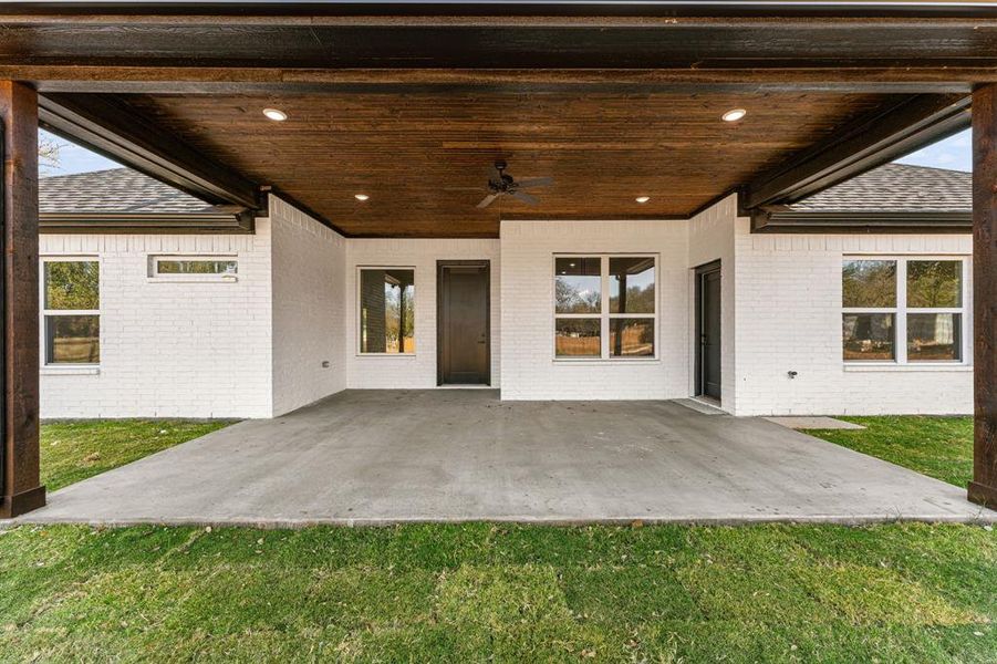 View of patio featuring a ceiling fan