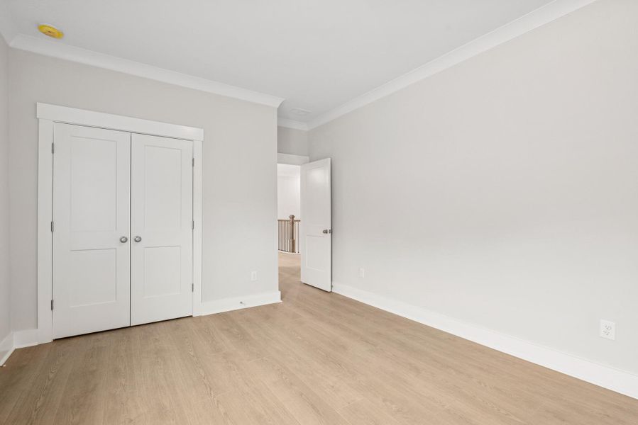 Spacious, unfurnished interior of a new home in Hidden Ponds Reserve, Awendaw (Image 12).