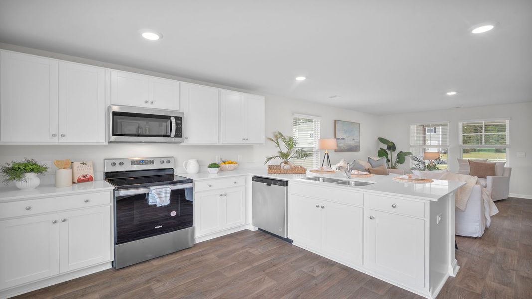 Representative furnished interior of a home built from the Curtis by D.R. Horton in Longleaf Village, Rincon (Image 8).