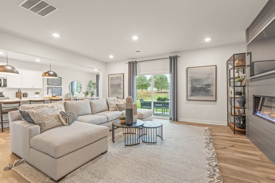 A living room with a large window.