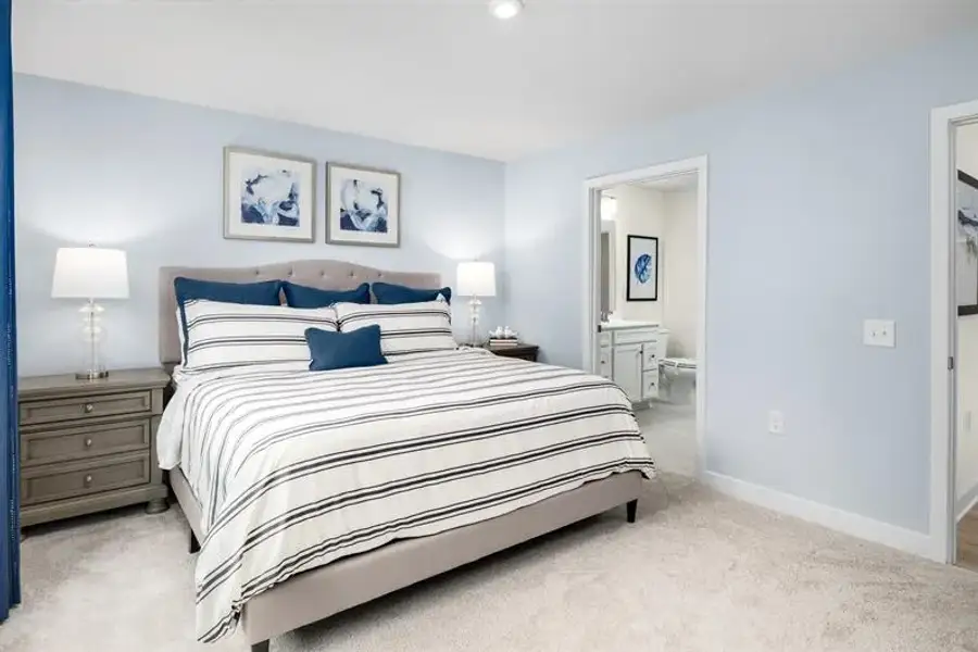 Representative furnished interior of a home built from the Nassau Cove - 3253 Edgehill Drive by Ryan Homes in Lakes at Riverbend, Navassa (Image 12).