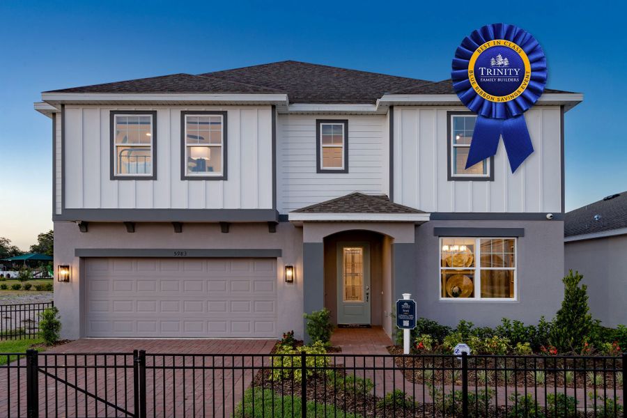 Front exterior of a new home in Pine Meadows Reserve, Eustis, FL, highlighting curb appeal (Image 2). Front exterior of a new home in Pine Meadows Reserve, Eustis, FL, highlighting curb appeal (Image 2).