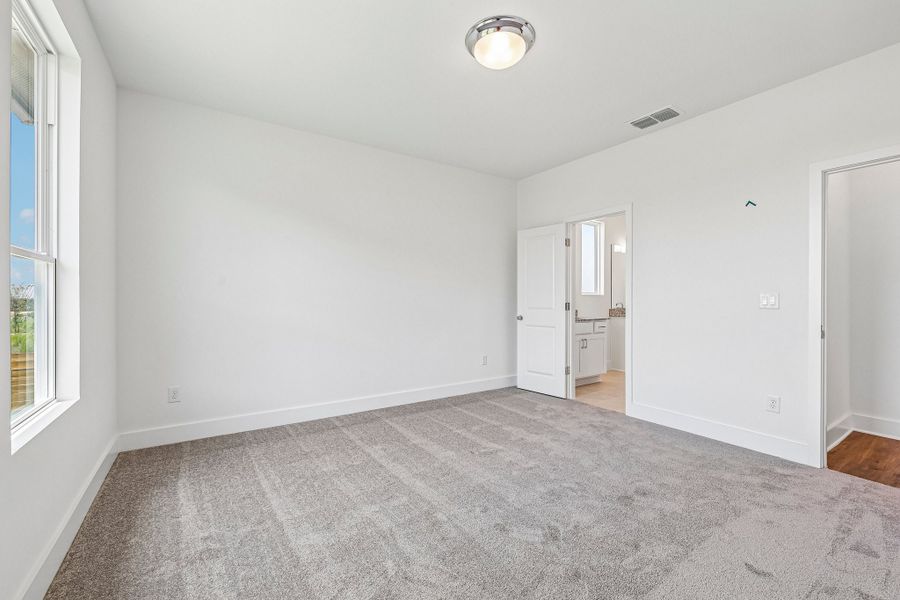 Spacious, unfurnished interior of a new home in Freedom at Anthem, Kyle (Image 14).