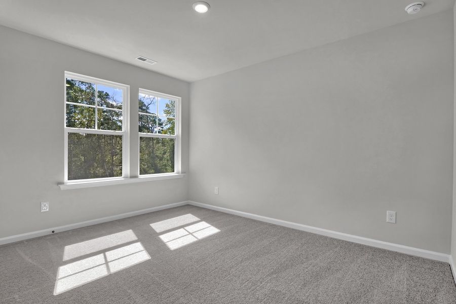 Spacious, unfurnished interior of a new home in Grand Park, Leland (Image 26). Spacious, unfurnished interior of a new home in Grand Park, Leland (Image 26).