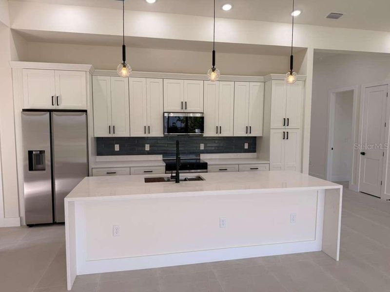 Furnished interior view inside a new home in , Port Charlotte (Image 15). Furnished interior view inside a new home in , Port Charlotte (Image 15).