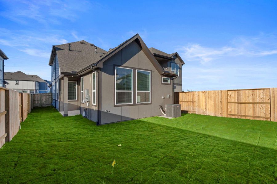 Exterior details and patio area of a home in Meridiana, Manvel (Image 3). Exterior details and patio area of a home in Meridiana, Manvel (Image 3).