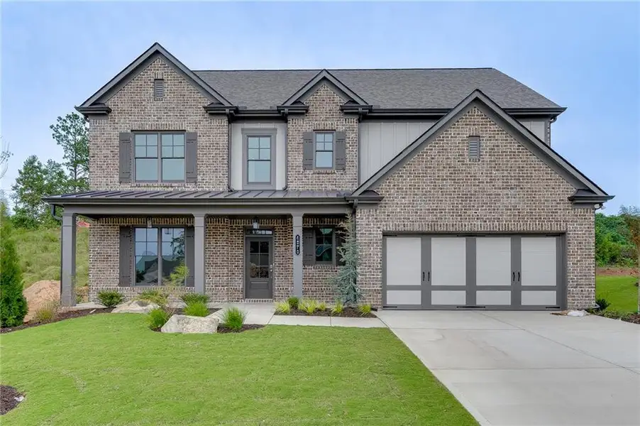 Front exterior of a new home in , Buford, GA, highlighting curb appeal (Image 1). Front exterior of a new home in , Buford, GA, highlighting curb appeal (Image 1).