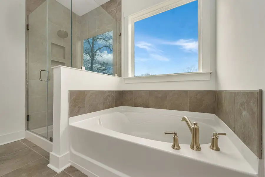 Furnished interior in a model home at Sweetbay Cove in Summerville (Image 4). Furnished interior in a model home at Sweetbay Cove in Summerville (Image 4).