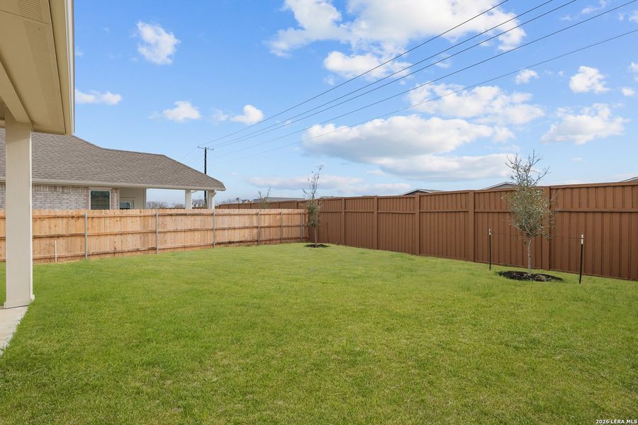 Exterior details and patio area of a home in Sunflower Ridge, New Braunfels (Image 23).