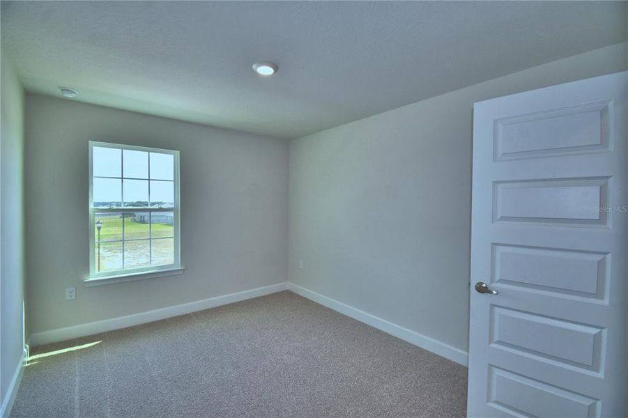 Spacious, unfurnished interior of a new home in Lake Juliana Estates, Auburndale (Image 33).