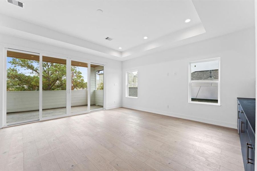 Third floor game room with covered patio that boasts great views of the city.