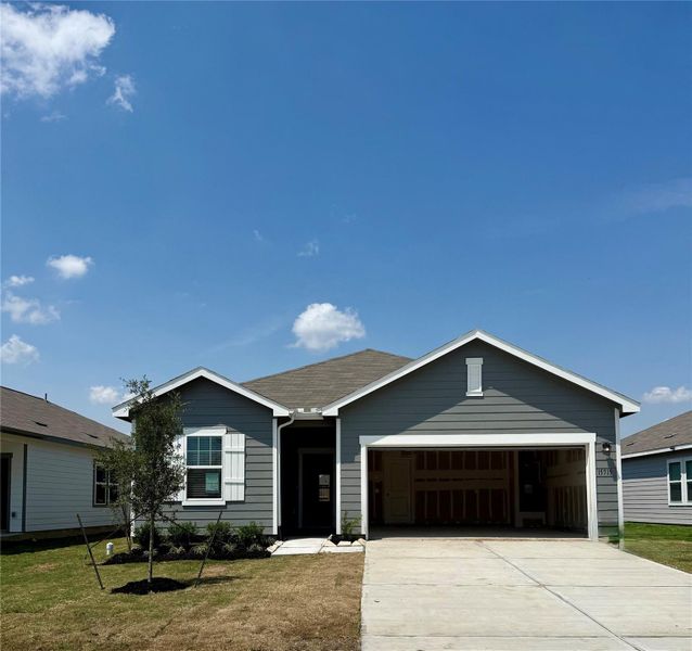 Front exterior of a new home in Cedar Pointe, Crosby, TX, highlighting curb appeal (Image 14). Front exterior of a new home in Cedar Pointe, Crosby, TX, highlighting curb appeal (Image 14).
