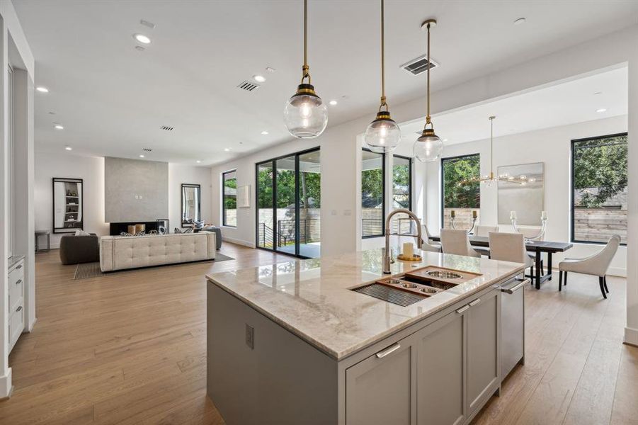 The 45" single-basin under-mount sink is situated on the island and the dishwasher is to the right making kitchen clean up a breeze!