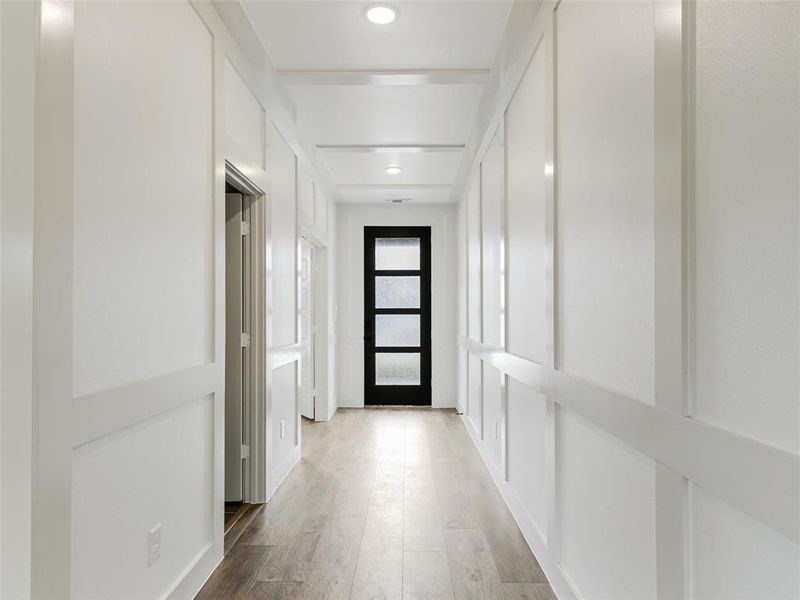 Entry with recessed lighting and luxury vinyl plank floor Entry with recessed lighting and luxury vinyl plank floor