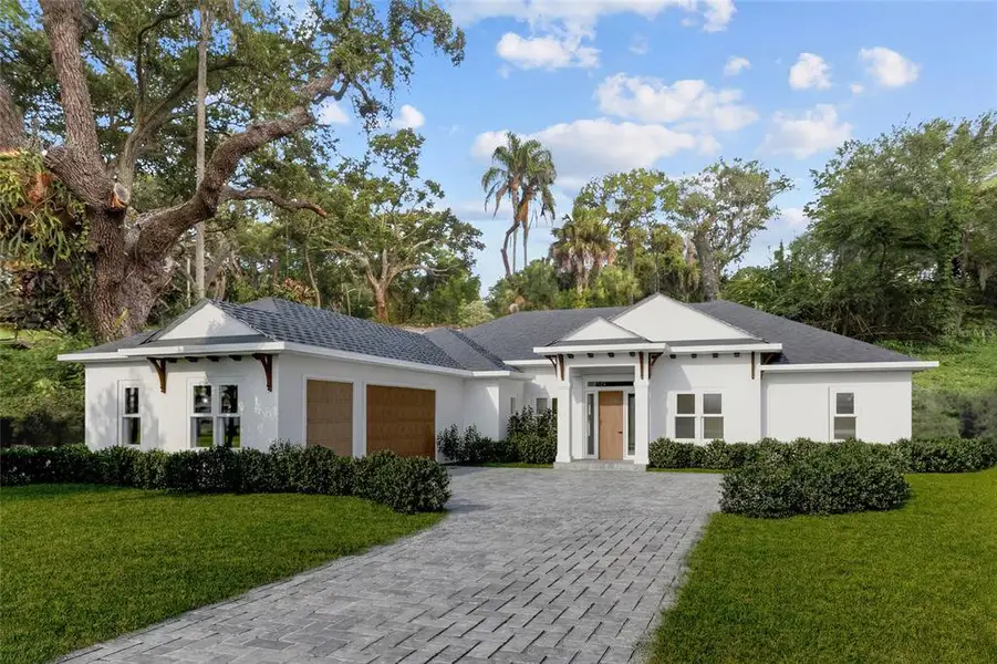 Front exterior of a new home in , Seminole, FL, highlighting curb appeal (Image 1). Front exterior of a new home in , Seminole, FL, highlighting curb appeal (Image 1).