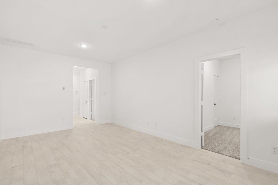 Spacious, unfurnished interior of a new home in Meridiana, Manvel (Image 34).