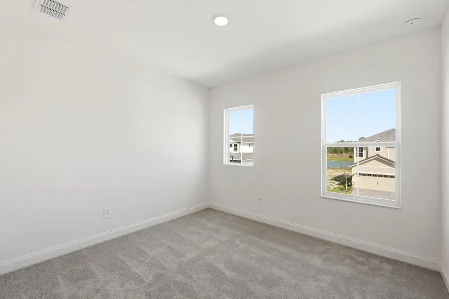 Spacious, unfurnished interior of a new home in Tamarack at Two Rivers, Zephyrhills (Image 17).
