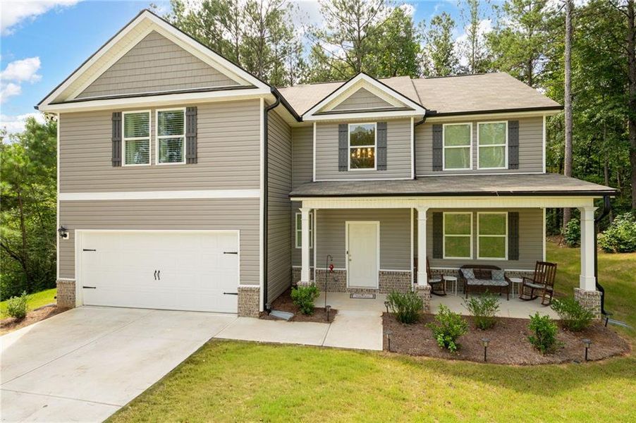 Front exterior of a new home in , Dallas, GA, highlighting curb appeal (Image 19).