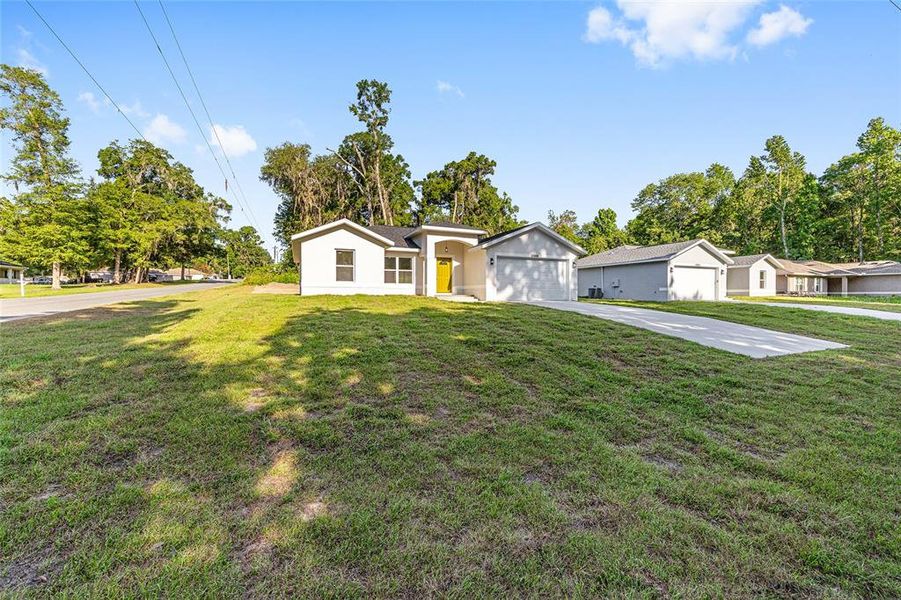 Front exterior of a new home in , Summerfield, FL, highlighting curb appeal (Image 2). Front exterior of a new home in , Summerfield, FL, highlighting curb appeal (Image 2).
