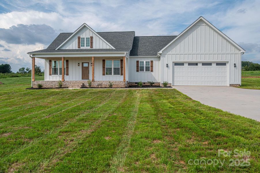 Front exterior of a new home in , Vale, NC, highlighting curb appeal (Image 29).