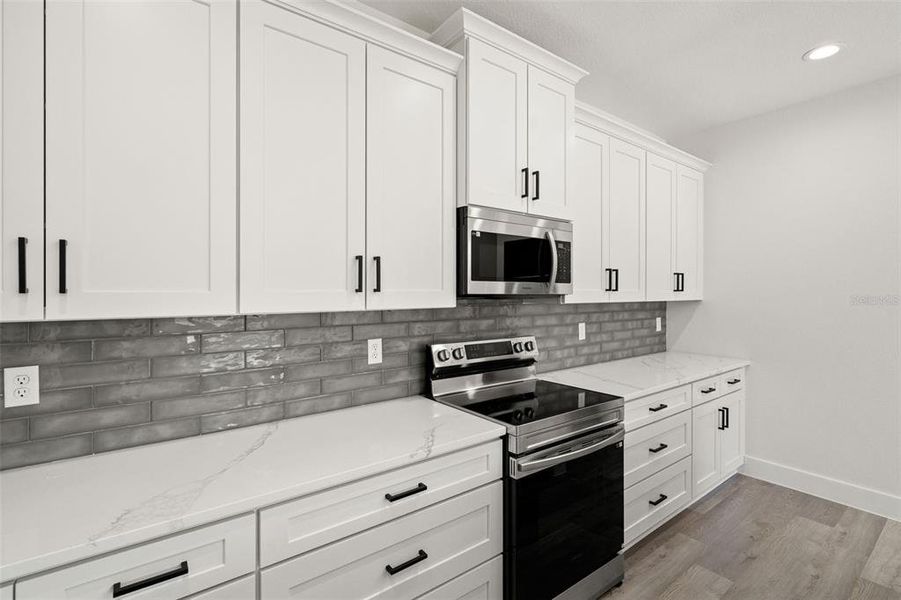Furnished interior view inside a new home in , Dunnellon (Image 8).