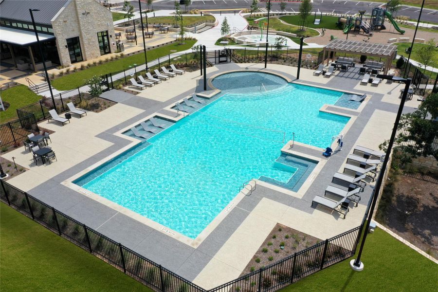 Community pool featuring a patio, a pergola, and a hot tub Community pool featuring a patio, a pergola, and a hot tub