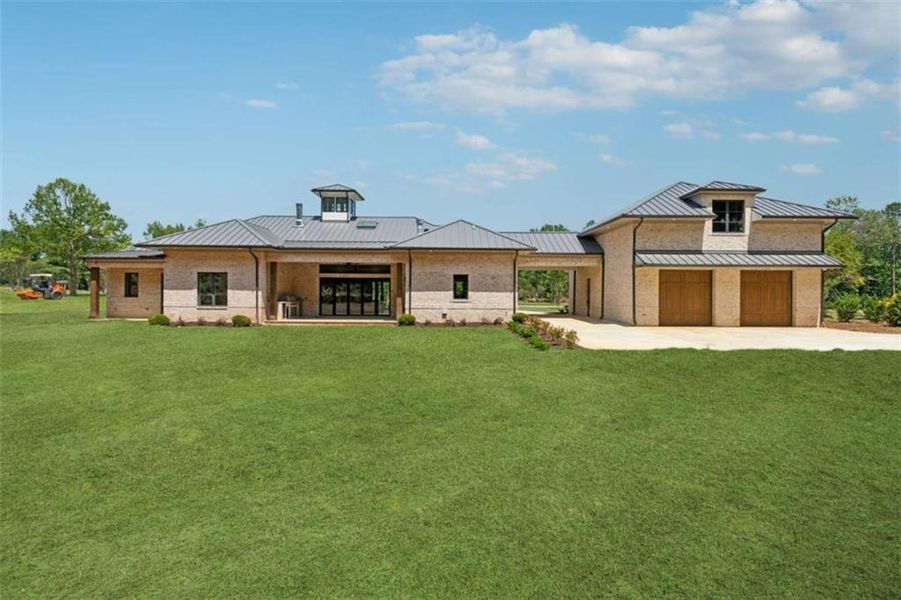 Front exterior of a new home in , Cumming, GA, highlighting curb appeal (Image 25). Front exterior of a new home in , Cumming, GA, highlighting curb appeal (Image 25).