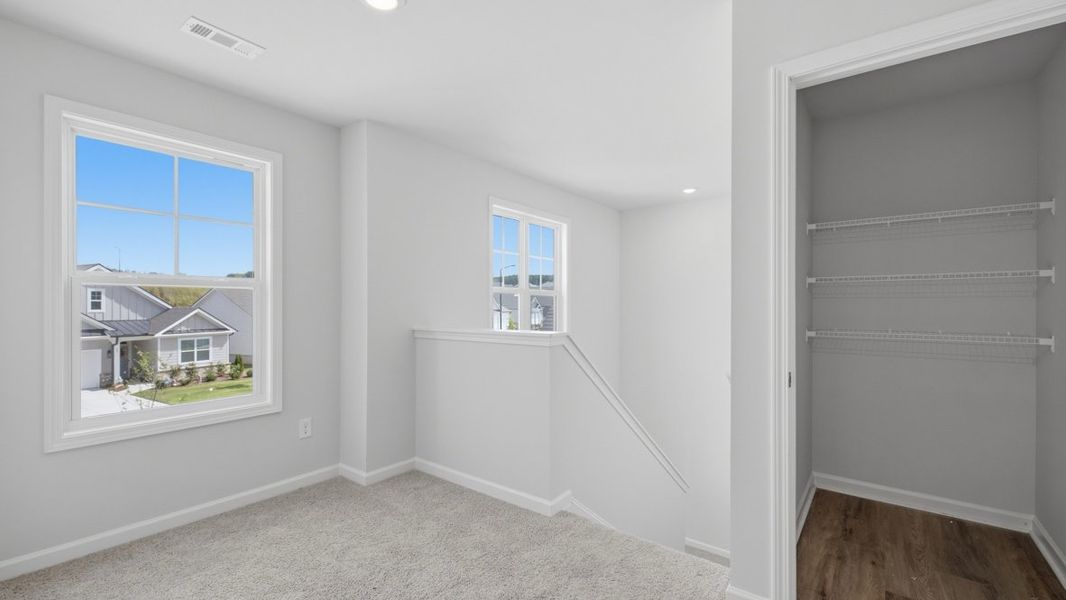 Representative unfurnished interior of a home built from the Belfort by D.R. Horton in Hamptons at Riverwood North, Dallas (Image 23).