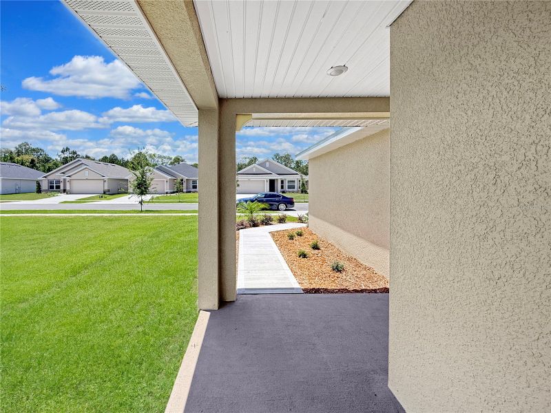 Exterior details and patio area of a home in Harmony Central, St. Cloud (Image 4).