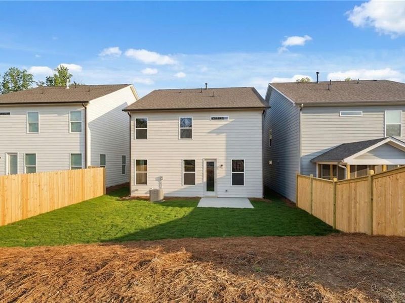 Exterior details and patio area of a home in The Village at Shallowford, Kennesaw (Image 4).