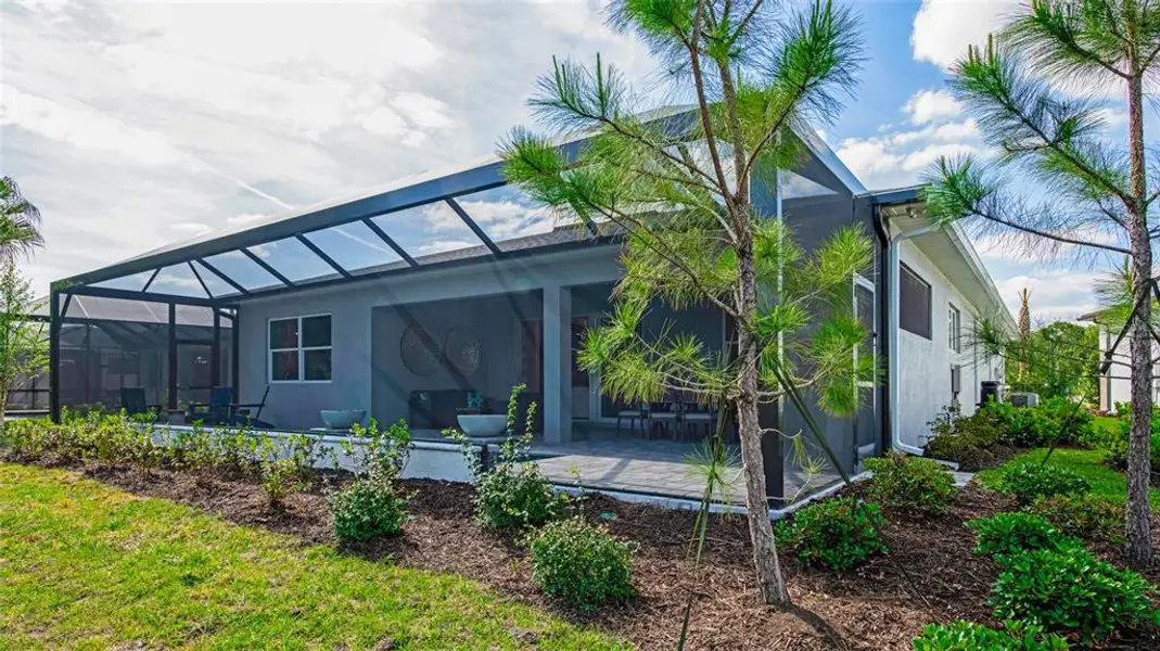 Exterior details and patio area of a home in Cresswind DeLand, Deland (Image 2). Exterior details and patio area of a home in Cresswind DeLand, Deland (Image 2).