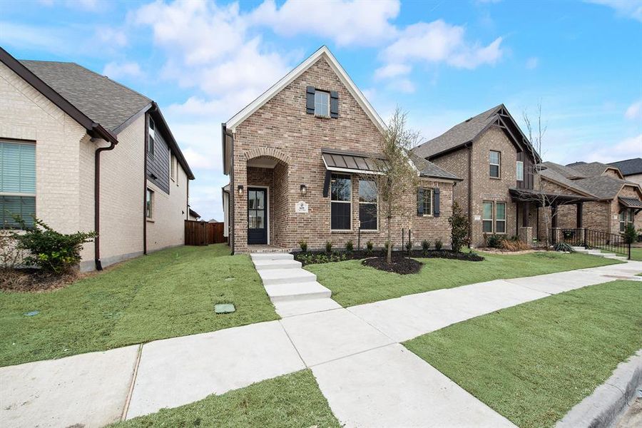 View of front facade featuring brick siding View of front facade featuring brick siding