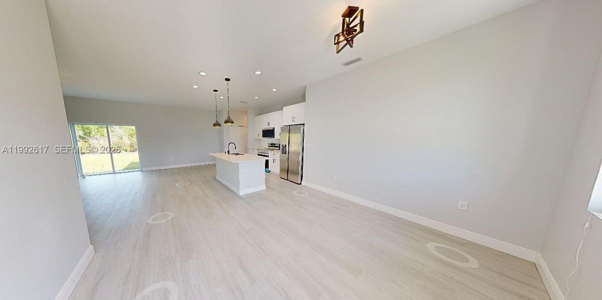 Spacious, unfurnished interior of a new home in , Port Charlotte (Image 23).